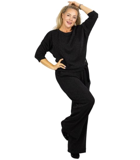 Elegancki komplet damski z połyskiem - bluzka + szerokie spodnie