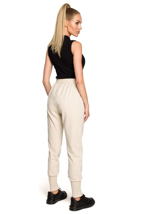 Spodnie Dresowe Model MOE692 Piasek - Moe - L Spodnie Dresowe Model MOE692 Piasek - Moe - L